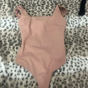 Never worn cross back bodysuit!